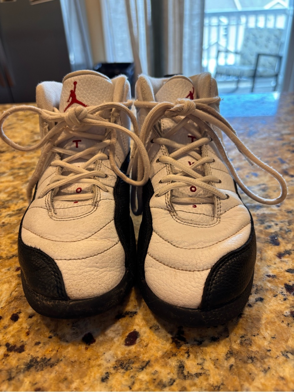 Jordan Kids' White and Black Basketball Shoes with Red Accents size 3y